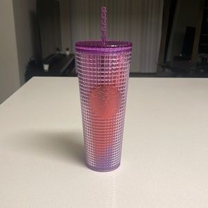 Purple and pink grid Starbucks cup